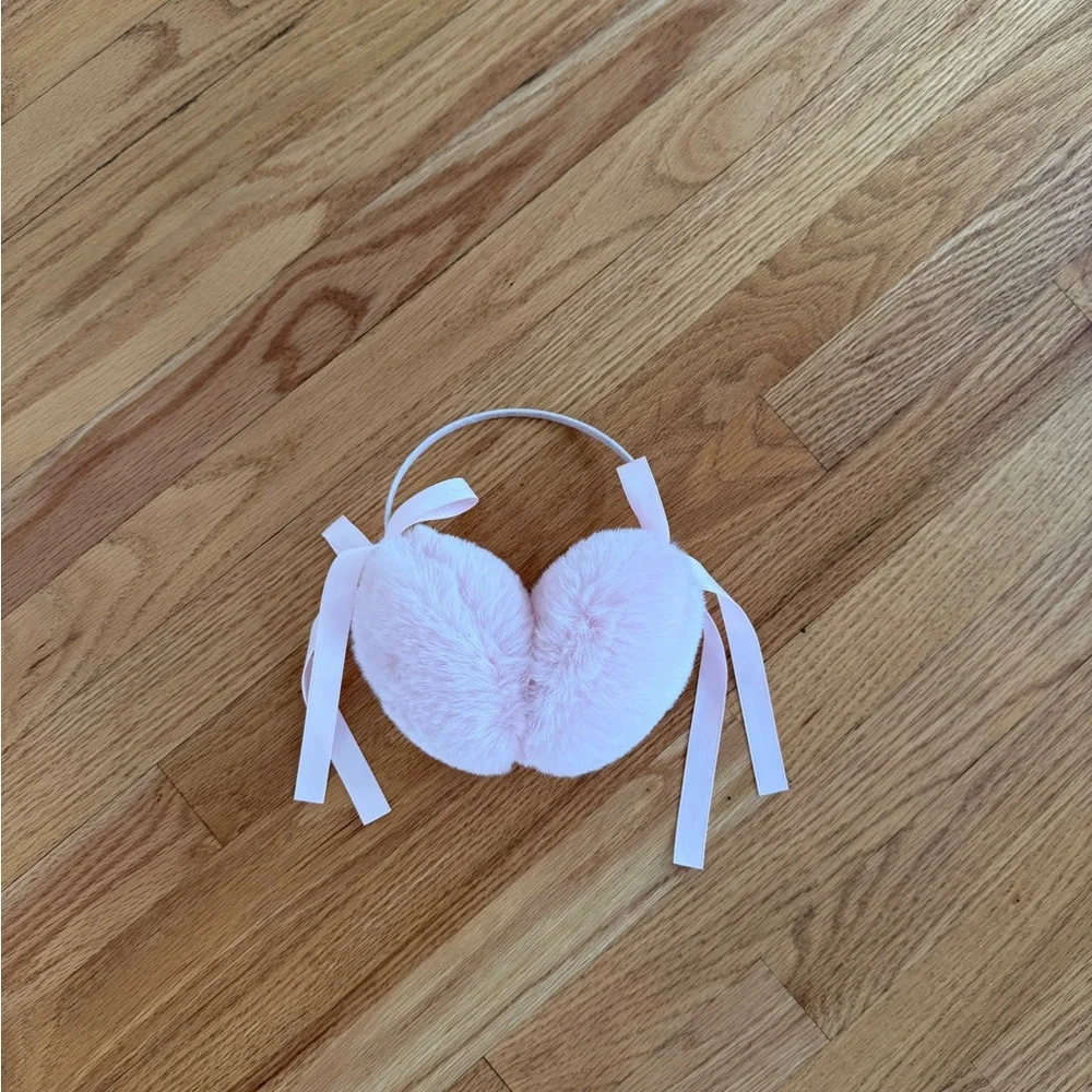 Light pink Pom Pom ear muffs fluffy with bows